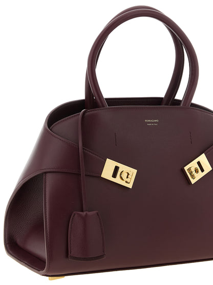 Hug Medium Top Handle Leather Bag